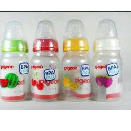 a collection of plastic bottles with different colored fruit.