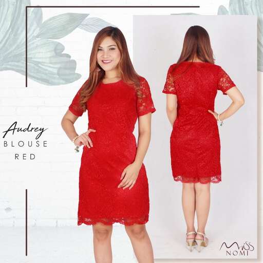 a woman in a red dress