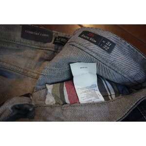 a pair of jeans with a label on the inside.