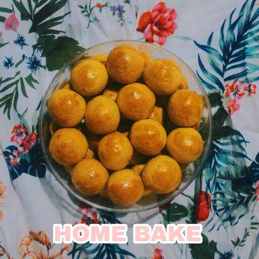 a bowl of oranges with some kind of glaze