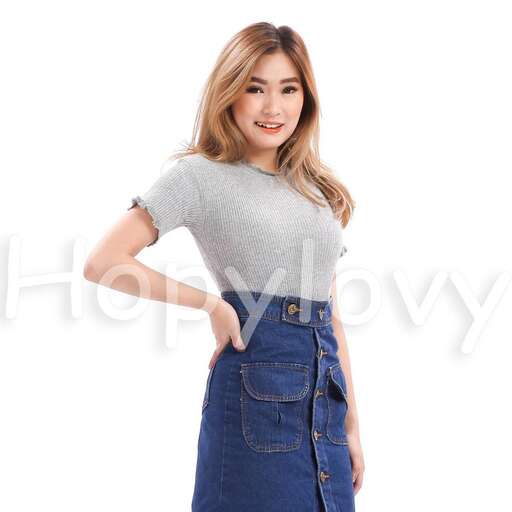 a model in a denim skirt