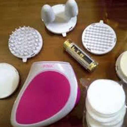 a table with various items on it including a pink and white object.