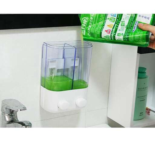 a container with a green liquid in it sitting on a shelf.