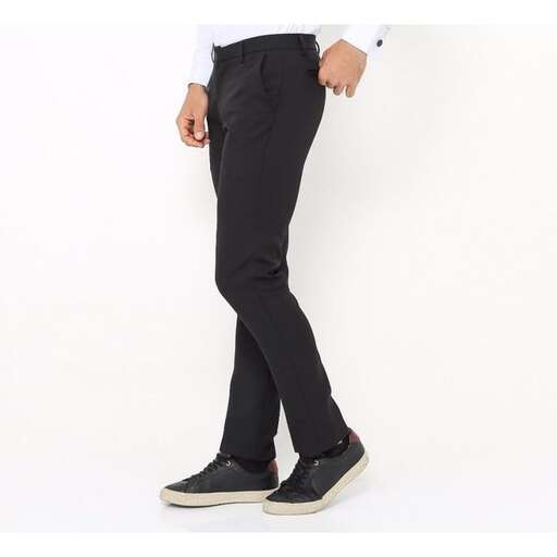 a pair of black trousers with a white shirt and black trousers.