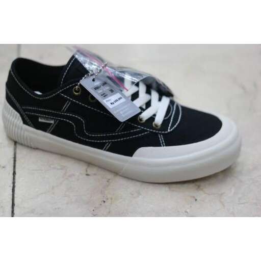 a pair of black and white sneakers