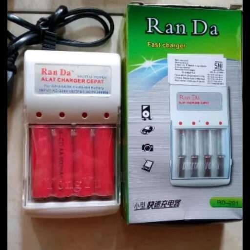 a battery charger with a black cord.