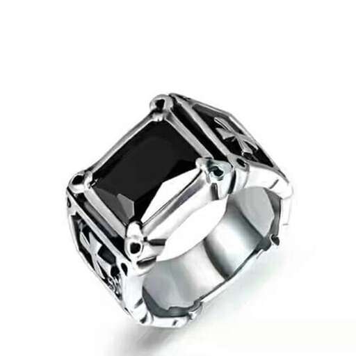 a ring that is made of platinum and is designed with a stone.