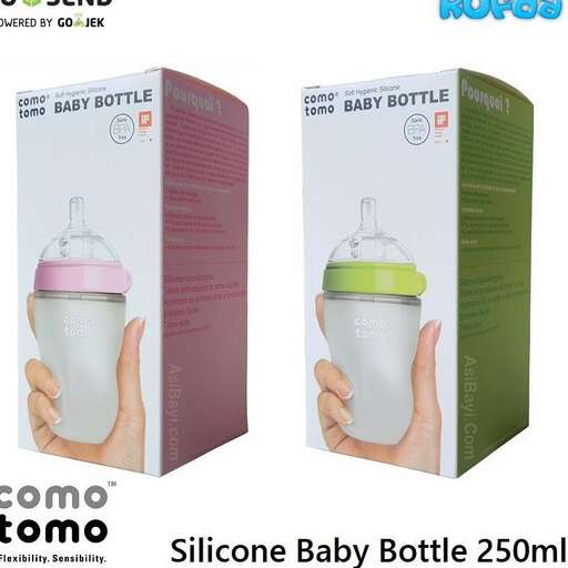 a bottle of baby bottle with a pink lid and a green lid.