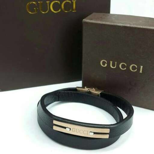 leather bracelet with a gold clasp