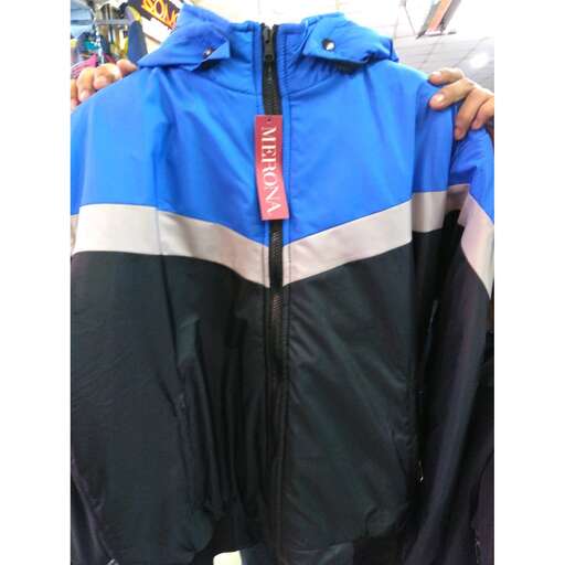 the jacket is available in black, white and blue.