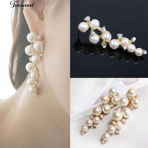 a pair of pearl and pearl earrings