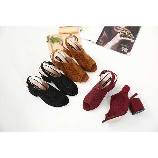 a collection of shoes that are on a white surface.