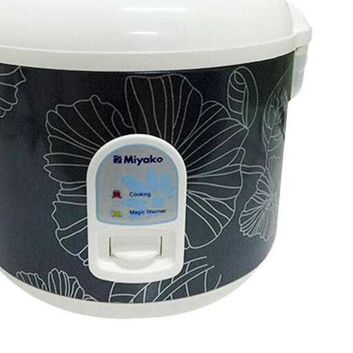 a plastic container with a white flower design on it.