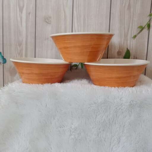 these bowls are made from an old wooden bowl.