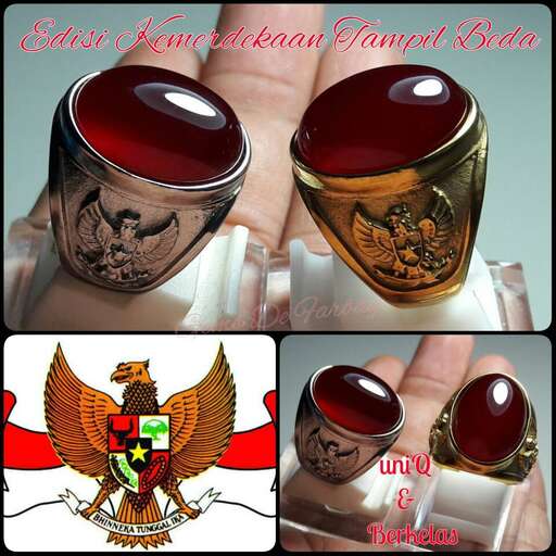 a set of three different colored glass bottles.