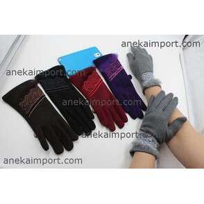 a pair of gloves with a blue tag.