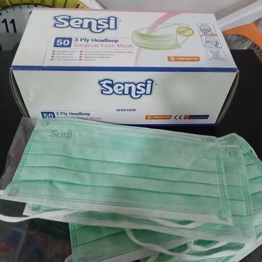 a box with a pair of gloves and a box of tissues.