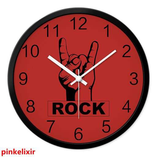 a clock with a pink rock in the shape of a rock