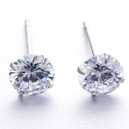 a pair of diamond earrings