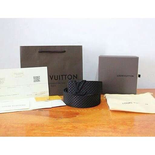 a collection of bags and envelopes on a table.