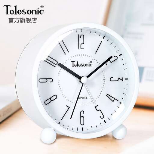 a clock that is sitting on a table.