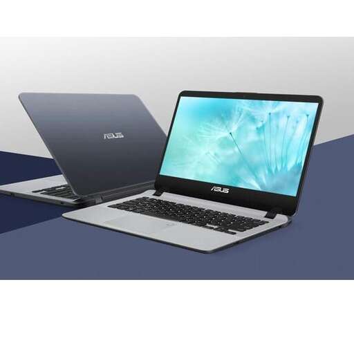 two laptop computers sitting on a table with a blue background.