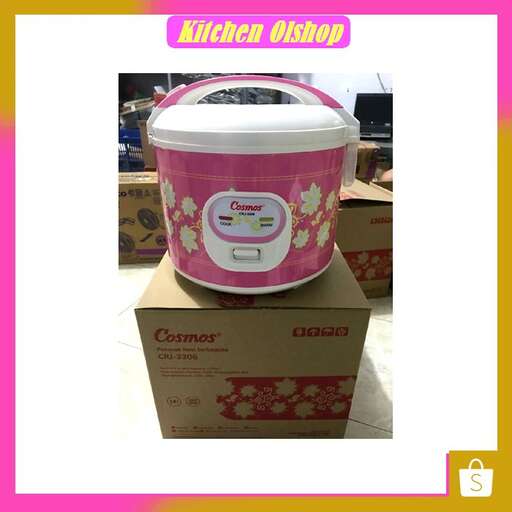 a pink and white bucket is sitting on a box.