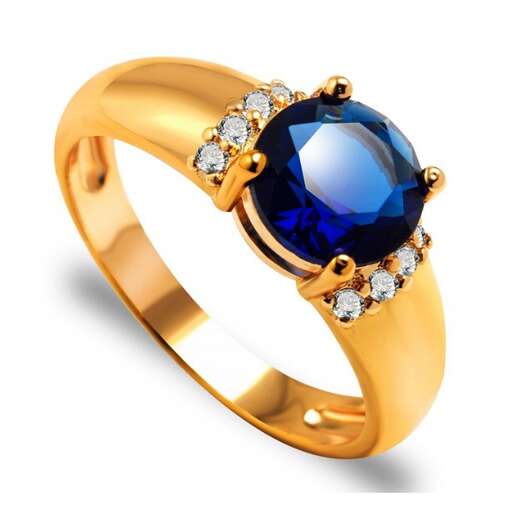 a ring with a sapphire and diamonds