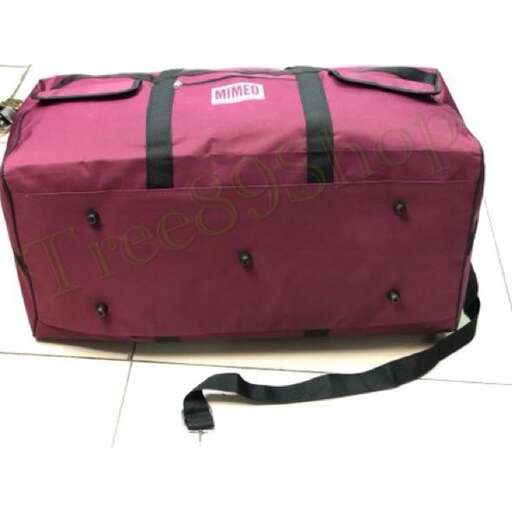 a pink bag with a black strap.