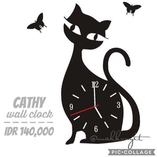 cat with a clock and birds.