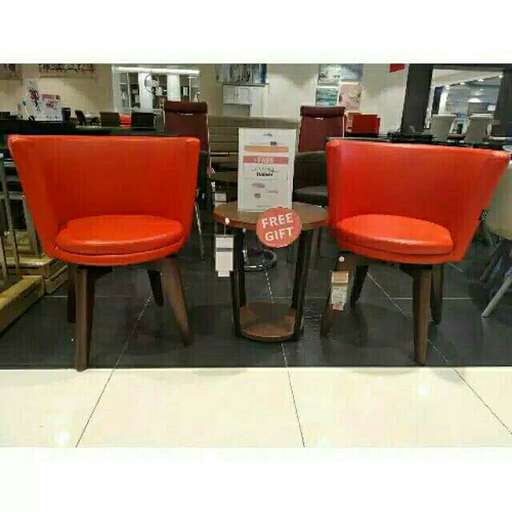 a pair of red chairs.