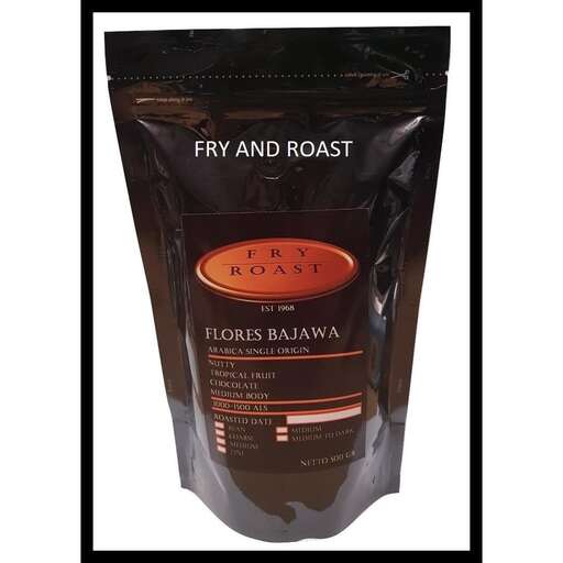 a bag of food that is on a black background.