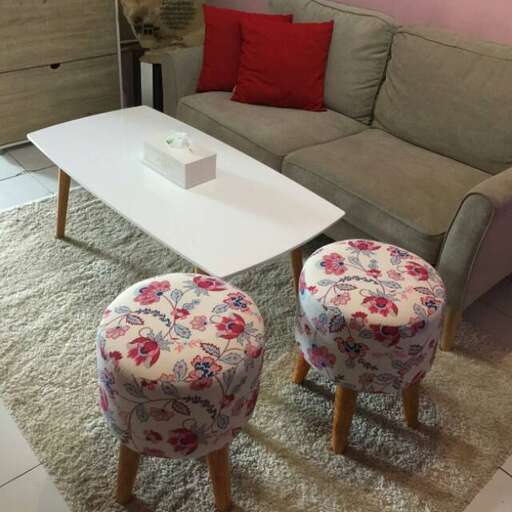 a pair of stools in a living room
