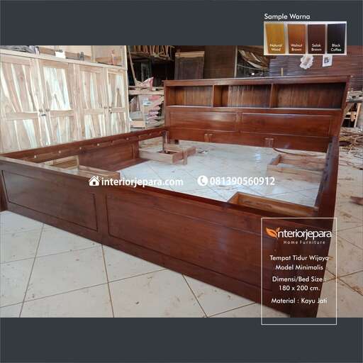 a large bed with a mattress and a mattress