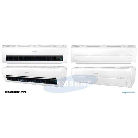 a white toaster oven with a black door and a white wall.