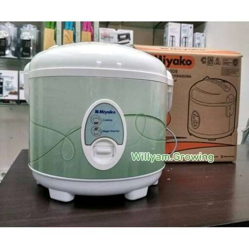 a small appliance on a table with a box on top of it.