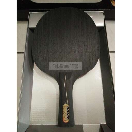 a large wooden spoon in a box.