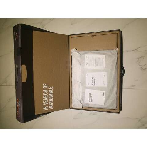 a box that has some papers in it.