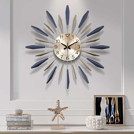 a wall clock with a blue and silver frame.