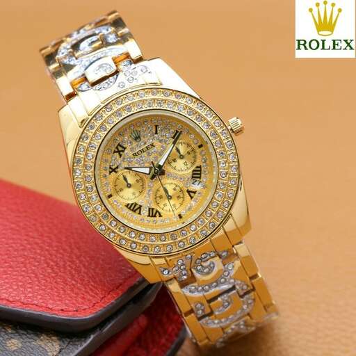 watch - gold watch with diamonds on the wrist