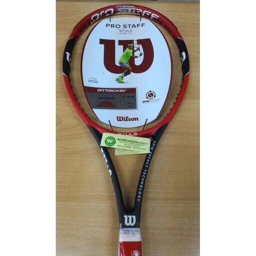 a tennis racket with a sticker on it.