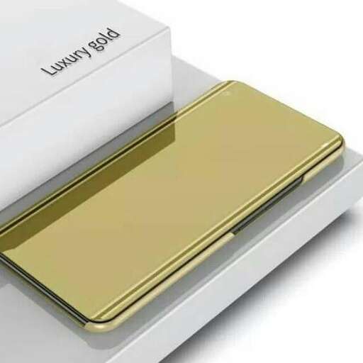 a gold tray with a reflection of the logo on it.