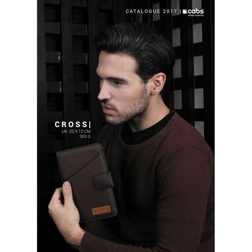 a man with a brown shirt holding a tablet