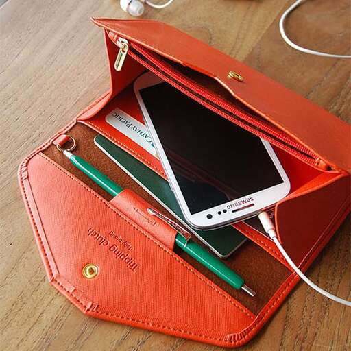 a wallet that has a cell phone in it.