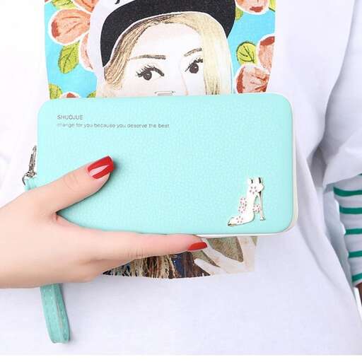 the handbag is a handmade clutch that is handmade from % cotton.