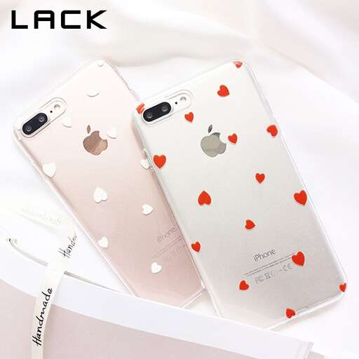 a pink iphone with hearts on the back and a white background.