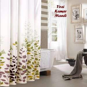 a curtain with a plant on it and a chair in front of it.