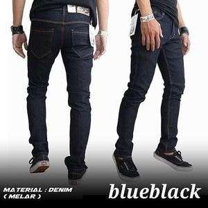 a man wearing a black shirt and blue jeans.