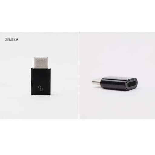 a white box with a black and silver lighter.