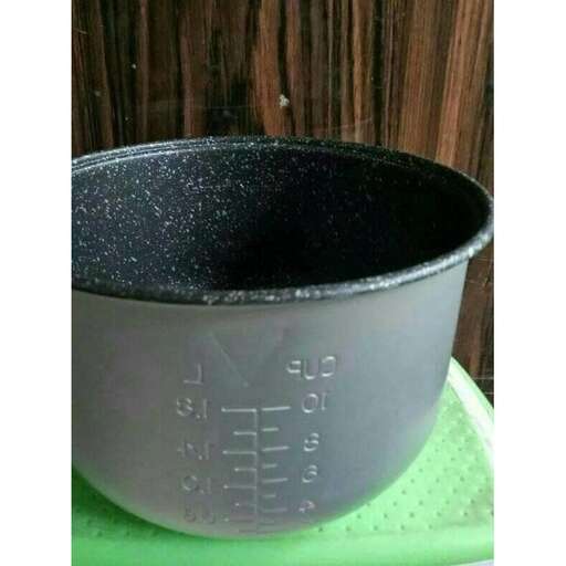 a large metal bowl with a number on it.